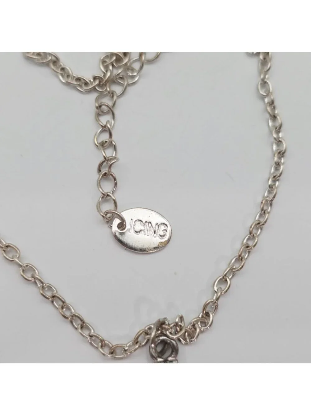 Silver Rhinestone Cross Pendant Necklace By Icing - Picture 4 of 7